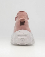 Back view of OrthoEase Luxe Blush sneaker featuring speckled heel