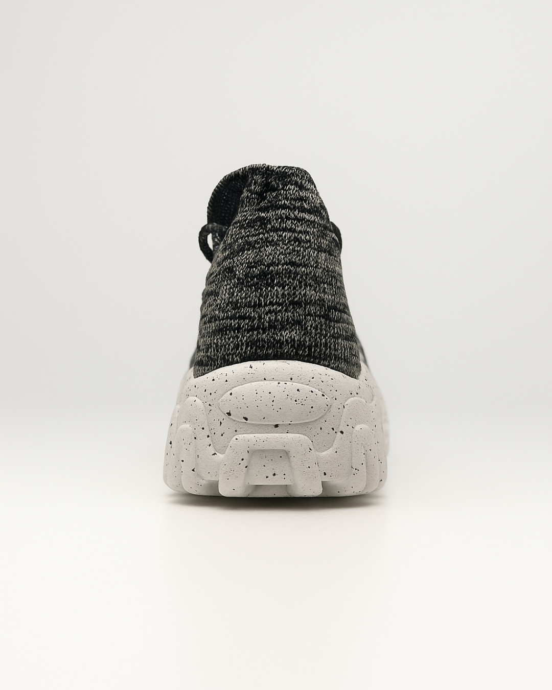 Rear heel view of Marble OrthoEase Luxe sneake