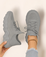 Top view of OrthoEase Luxe Silver sneakers in light grey knit with tone-on-tone sole