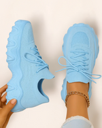 Top view of OrthoEase Luxe Skylight sneakers in baby blue with matching sole