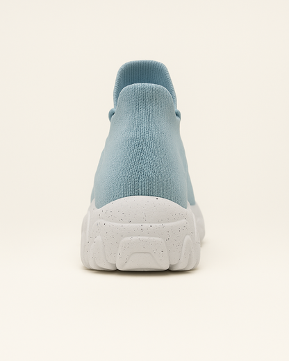Back heel of OrthoEase Luxe Glacier sneaker showing ankle height