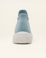 Back heel of OrthoEase Luxe Glacier sneaker showing ankle height