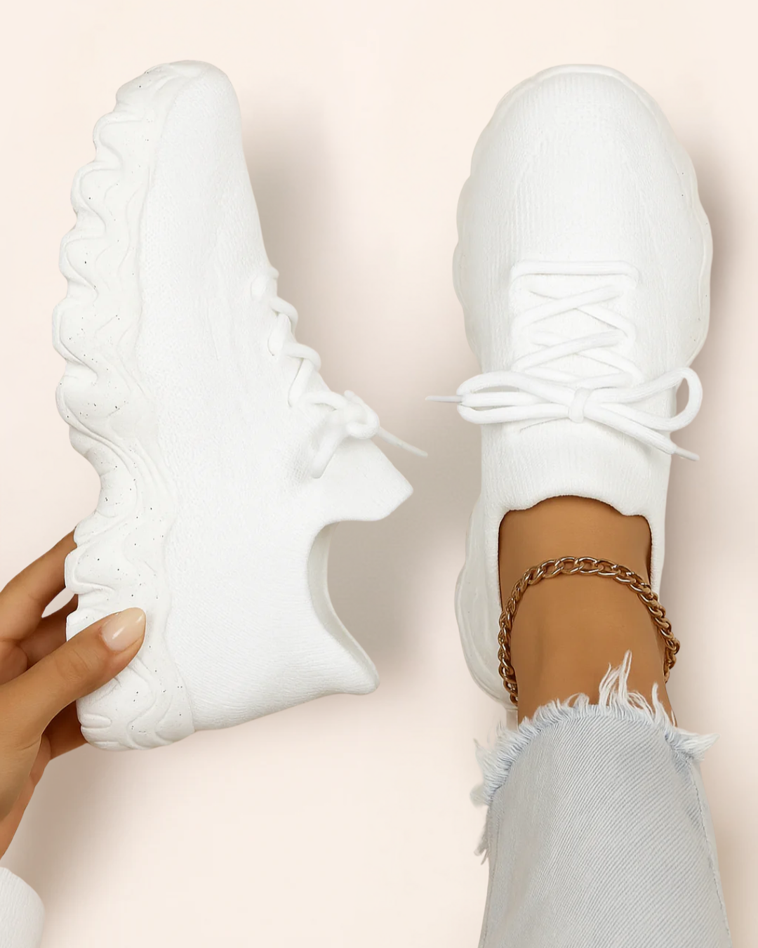 Top view of OrthoEase Luxe Ice sneakers in clean white with speckled sole