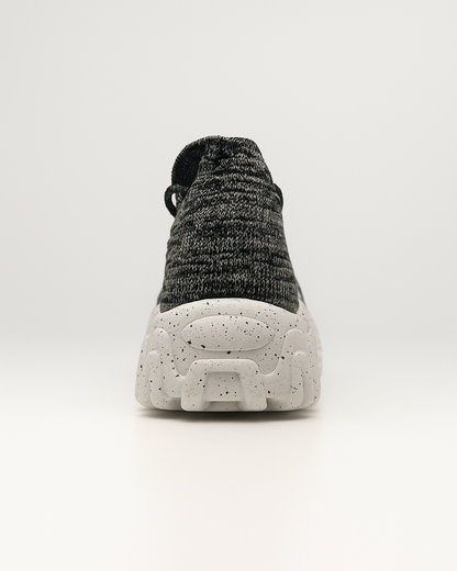 Rear heel view of Marble OrthoEase Luxe sneake