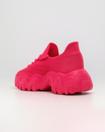 Rear angled view of OrthoEase Luxe Pop Pink sneaker