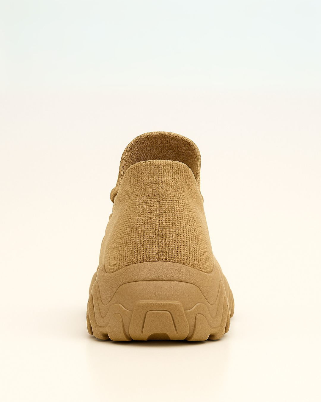 Back heel of beige OrthoEase Luxe Sand sneaker with neutral tone