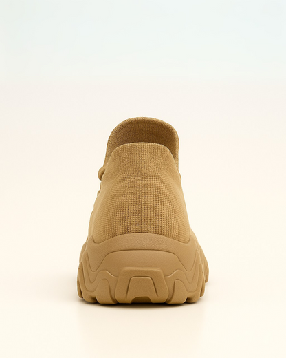 Back heel of beige OrthoEase Luxe Sand sneaker with neutral tone