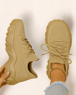 Top view of OrthoEase Luxe Sand sneakers in beige knit with matching sole