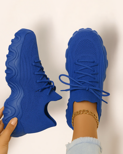 Top view of OrthoEase Luxe Sapphire sneakers in deep blue with tone-on-tone sole